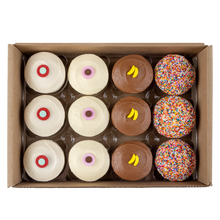 Load image into Gallery viewer, banana dark chocolate assorted dozen box of cupcakes featuring 3 red velvet, 3 vanilla, 3 banana dark chocolate and 3 sprinkle not-bg